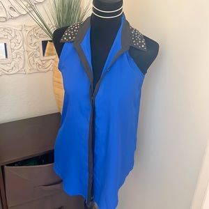 indigo blue sleeveless button up.